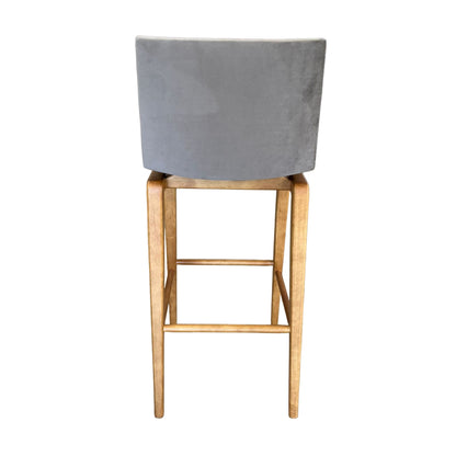 Taburete Horus de madera tapizado en ante gris